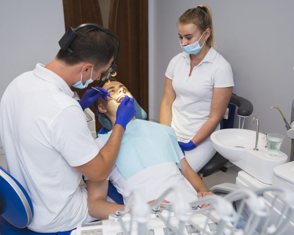 patient-dentist-getting-procedure-done patient-dentist-getting-procedure-done